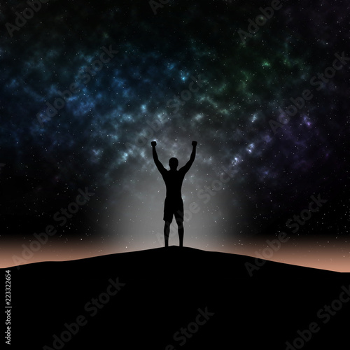 Man silhouette hands up at mountain on star light background.