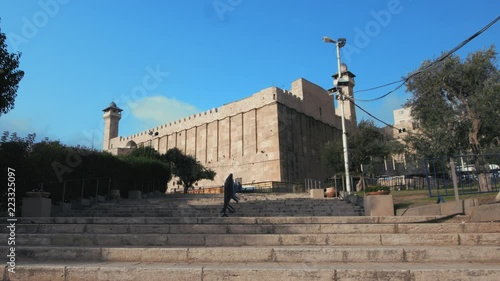 Hebron, Al Khalil, Palestine, West Bank. Side dolly left, the Ibrahimi Mosque, Al Haram Al Ibrahimi, The Cave of the Patriarchs, southern view. 4K footage photo