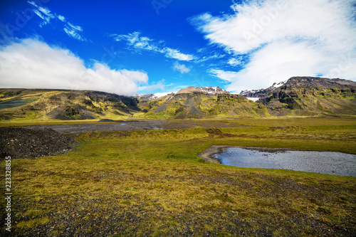A beautiful Iceland landscape in summer, hills in the background. © Halfpoint