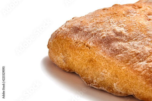traditional italian wheat bread ciabatta cooked with olive oil on white background. Closeup
