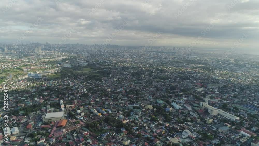 Aerial view of Manila city with skyscrapers and buildings. Philippines, Luzon. Aerial skyline of Manila. Aerial view of Manila city with skyscrapers and buildings. Philippines, Luzon. Aerial skyline of Manila.