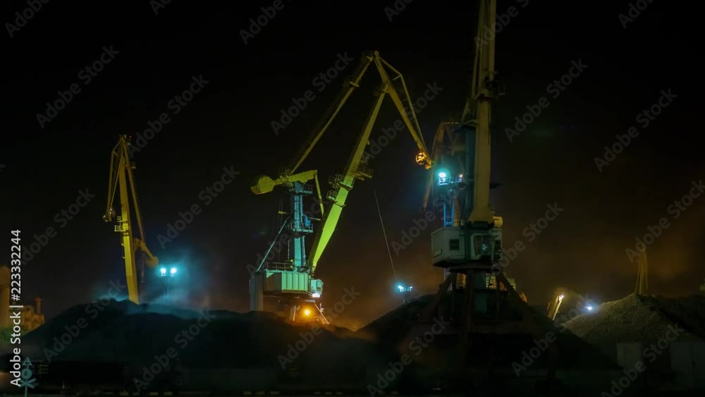 Port. Coal Terminal. The Night Loading Coal on the Quay at the Port Port. Coal Terminal. The Night Loading Coal on the Quay at the Port