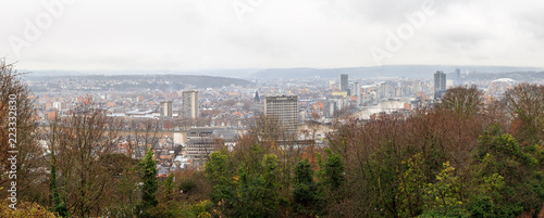 Beautiful cityscape panorama view of the skyline of Liege, Belgium, with the river Meuse on a rainy winter day seen from the top of the Montagne de Bueren 
