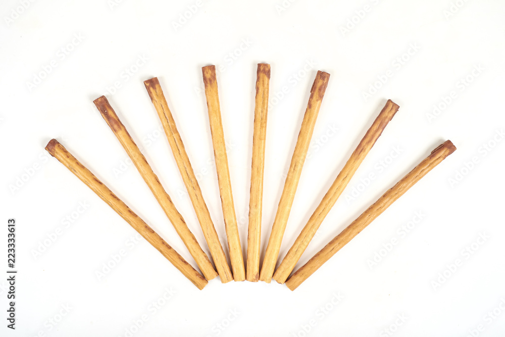 biscuit sticks with sweet filling on white background.