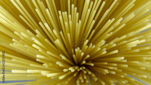 Spaghetti yellow italian pasta line pattern food background concept,Close up Top View..