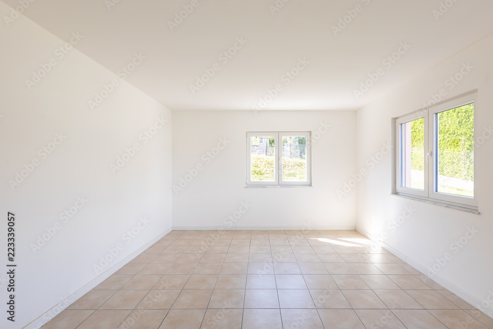Obraz premium White empty room with tiles and windows