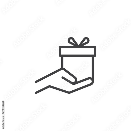 Gift box in hand outline icon. linear style sign for mobile concept and web design. Gift on palm line vector icon. Present symbol, logo illustration. Pixel perfect vector graphics
