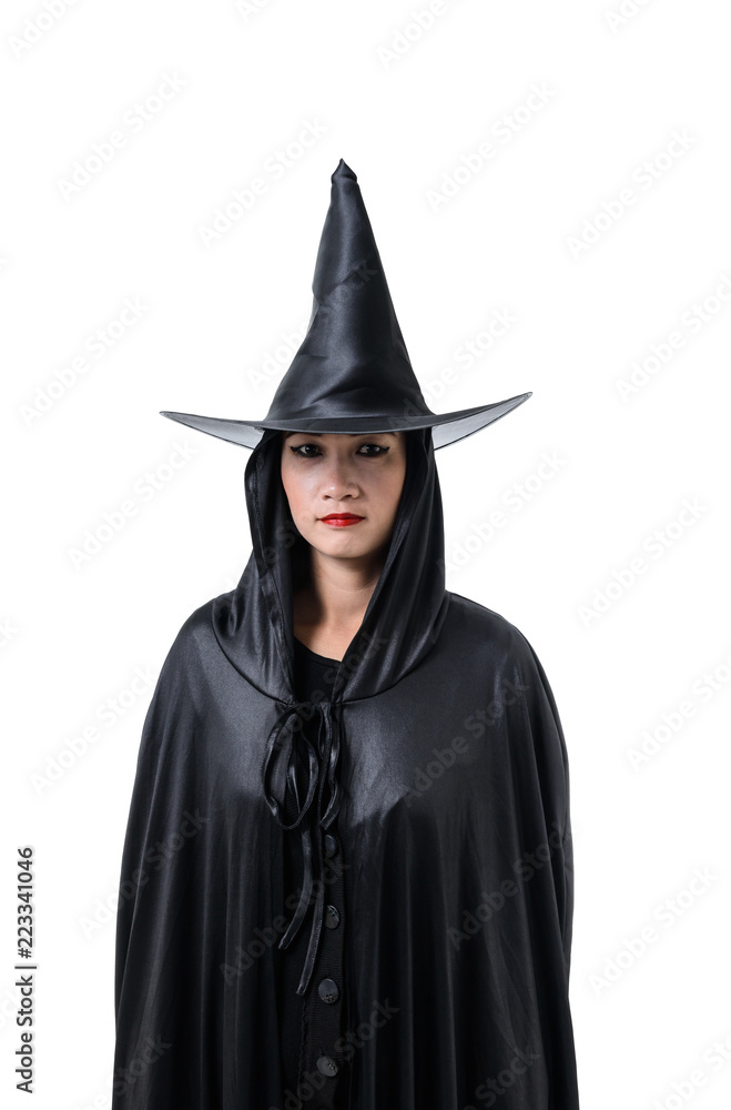 Portrait of woman in black Scary witch halloween costume standing with hat isolated on white background Portrait of woman in black Scary witch halloween costume standing with hat isolated on white background