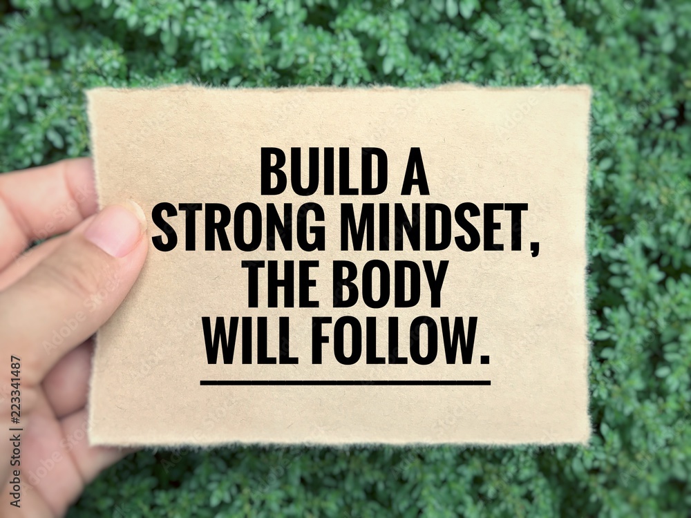 Obraz premium Motivational and inspirational quote - Build a strong mindset, the body will follow. Blurred styled background.