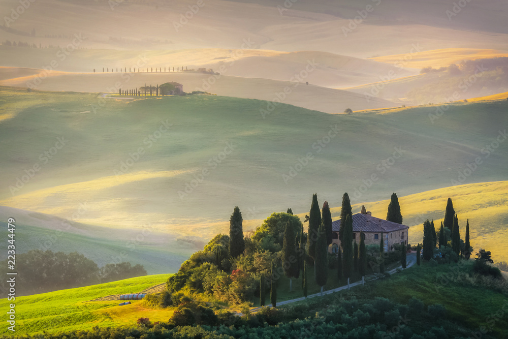 Tuscany green rolliing hills and field landscape