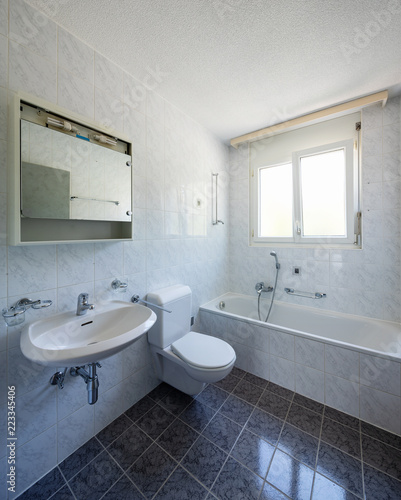 Vintage bathroom with tiles