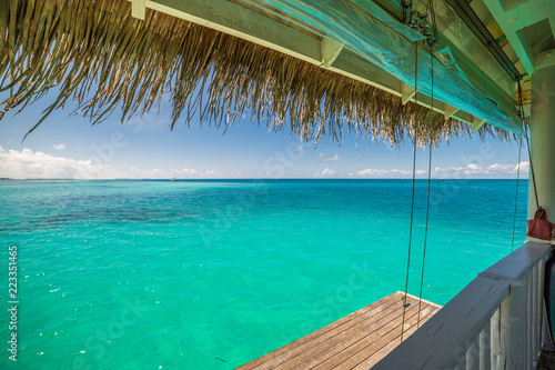 The beautiful ocean views form staircase Maldives water villa , View from runway the indian ocean bay, beach pier for jumping, fishing and snorkeling, Maldives islands © icemanphotos
