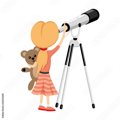 Girl observes the stars in a telescope.