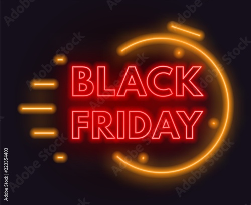 Black Friday neon lettering on brick wall background.