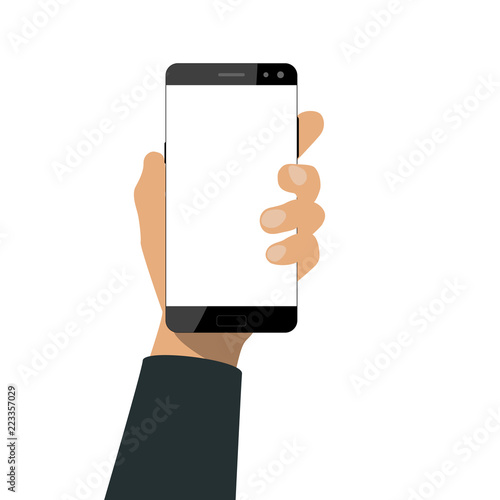 Hand holds a smartphone