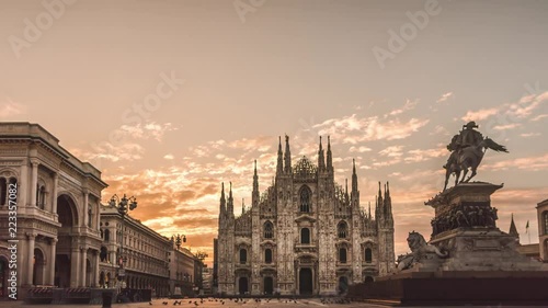 milano city center duomo square cathedral with monument sunrise summer day time lapse photo