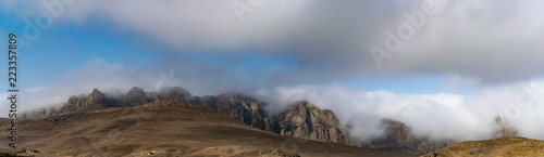 Evening panoramic view of Mount Talysh. Amazing dawn sky over the misty mountains. Azerbaijan, Yardymli. panorama