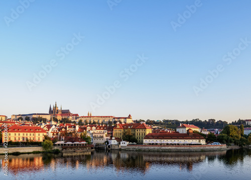 View over Vltava River towards Lesser Town and Castle at sunrise, Prague, Bohemia Region, Czech Republic