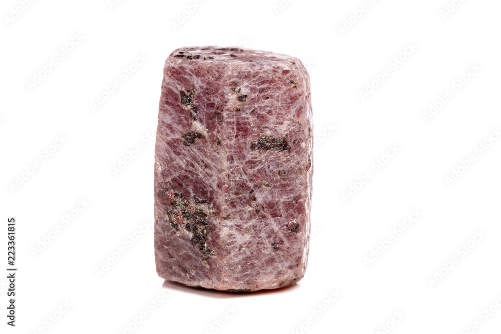 Macro mineral stone Ruby in the breed a white background Macro mineral stone Ruby in the breed a white background