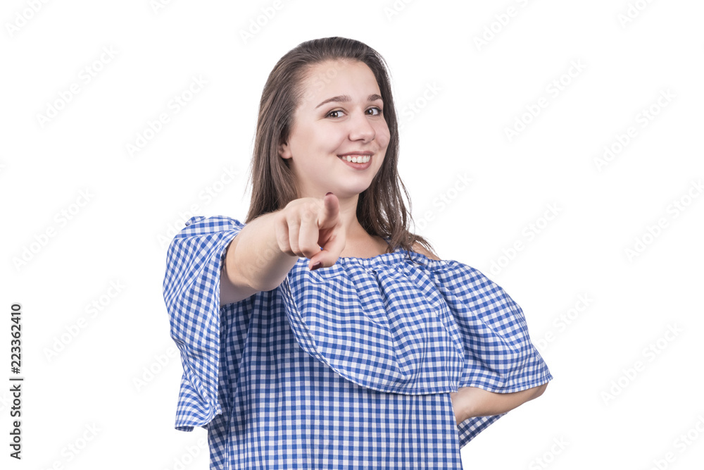 Beautiful smiling woman in a plaid blouse showing a finger at the camera, isolated on a white background Beautiful smiling woman in a plaid blouse showing a finger at the camera, isolated on a white background
