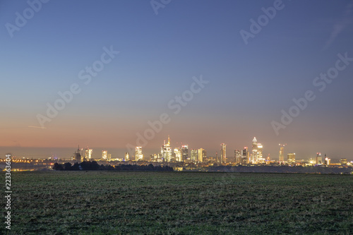 skyline of Frankfurt  in early morning with illuminated skyscraper © travelview