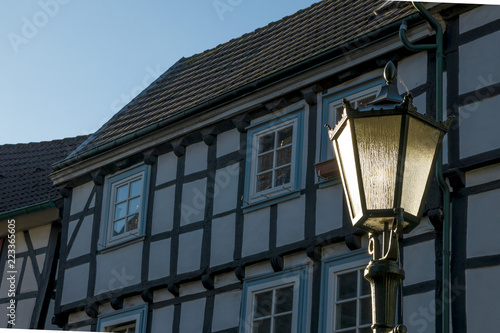 Streetlight in the morning with Framehouse in germany / Hattingen photo