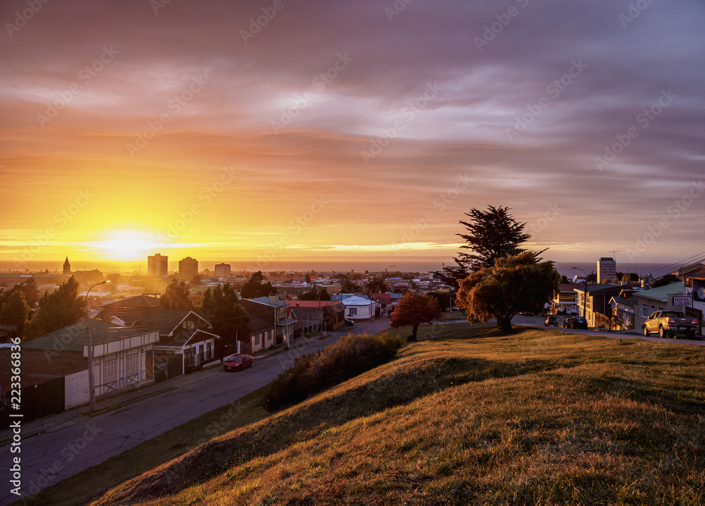 View over city towards Strait of Magellan at sunrise, Punta Arenas, Magallanes Province, Patagonia, Chile