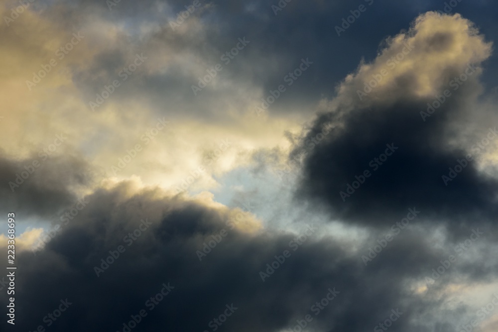 Clouds in sky with dark and orange color