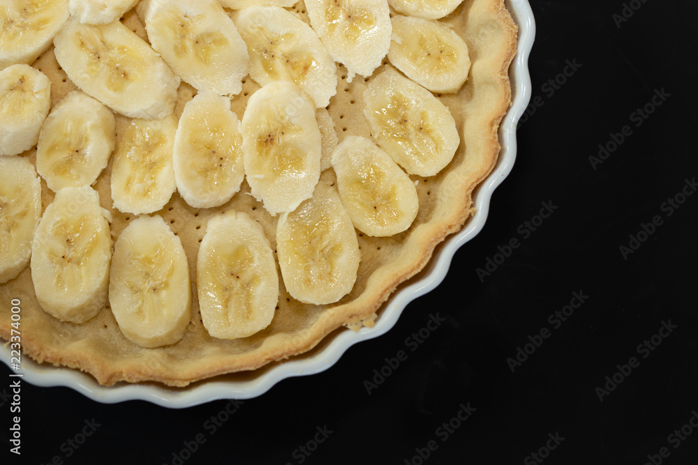 Banana pie on a black background Banana pie on a black background