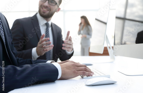 business colleagues sitting at their Desk