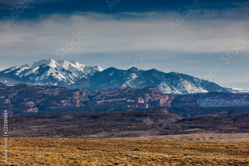 Snow Capped Peaks And Cloudy Skies In Moab Utah