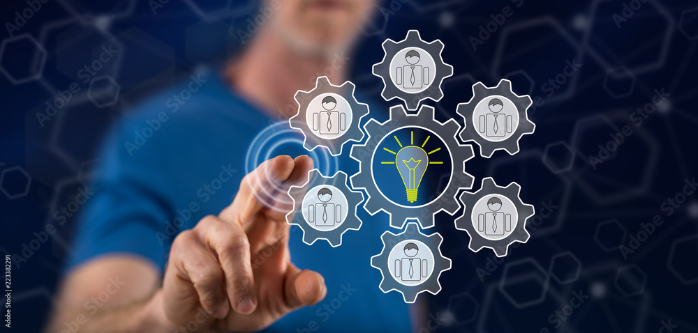Man touching a teamwork idea concept Man touching a teamwork idea concept