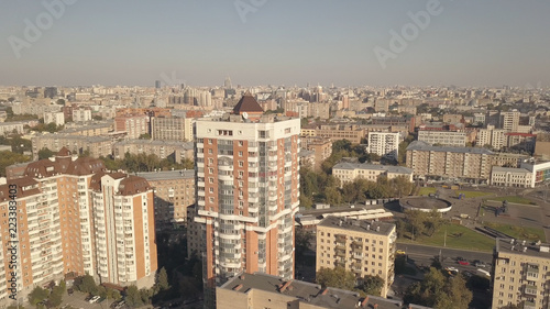 Panoramic view residential building in city. City building and moving car road