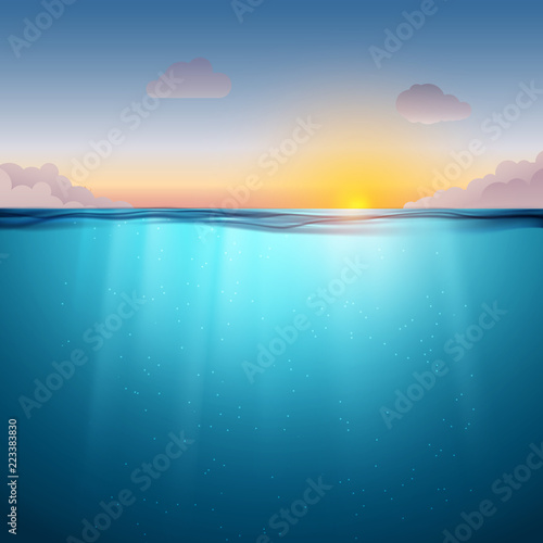 Underwater ocean surface. Blue water background and sunset. Clean nature sea underwater backdrop with sky