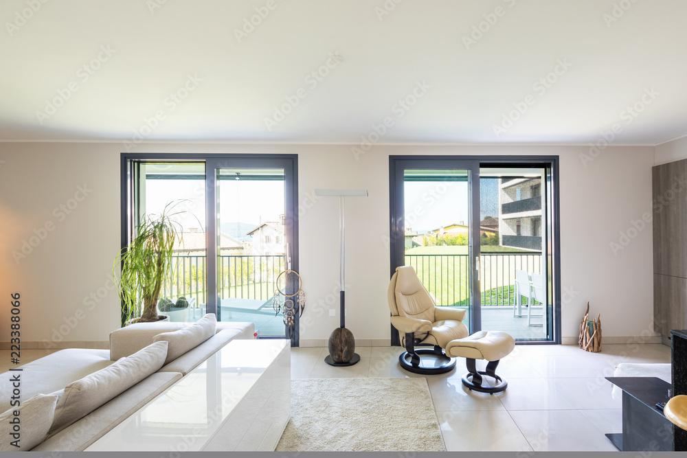 Fototapeta premium Living room and kitchen in open space, modern apartment