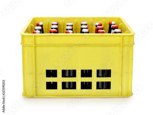 Crate with beer bottles isolated on white, contains clipping path