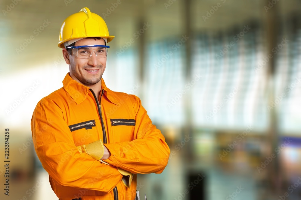 © BillionPhotos.com - Young man in work uniform and yellow © BillionPhotos.com - Young man in work uniform and yellow