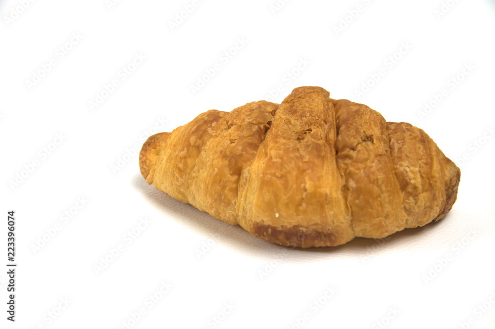 Golden brown bread on a white isolated background Golden brown bread on a white isolated background