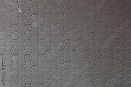 A simple white texture pattern of hexagons as a background