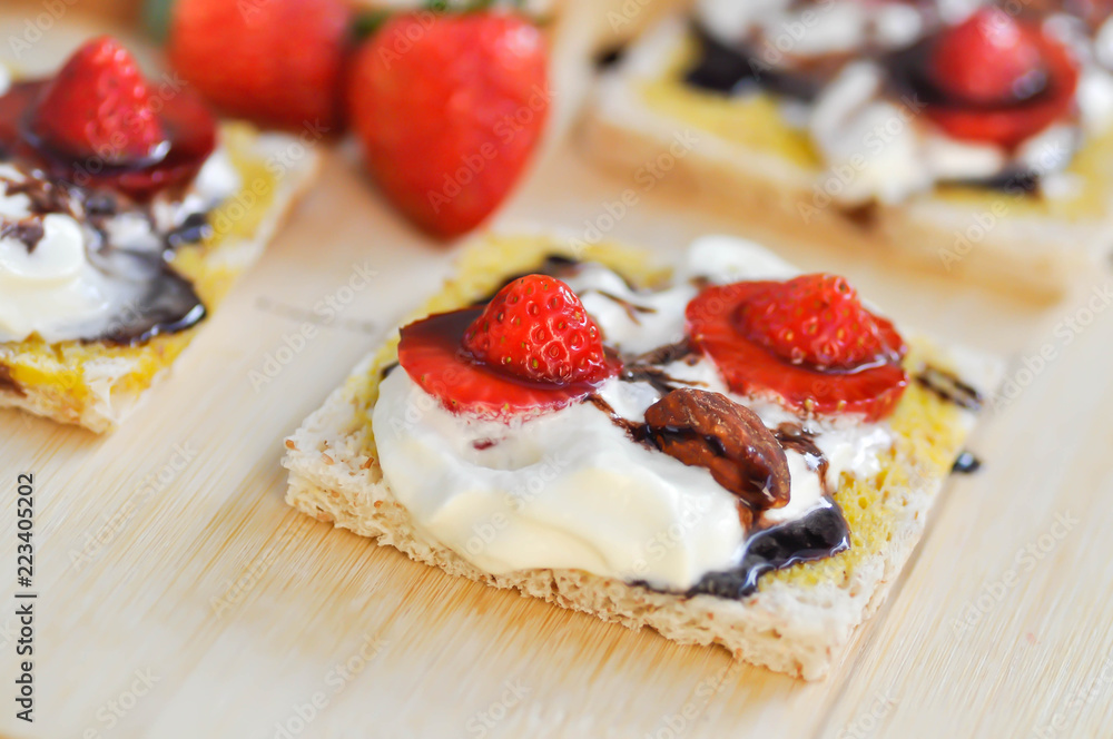 bread and canape with strawberry topping bread and canape with strawberry topping