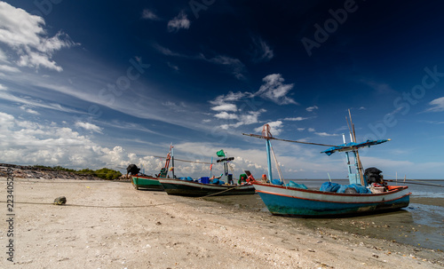 Fisherman boats on the shoreline in Thailand