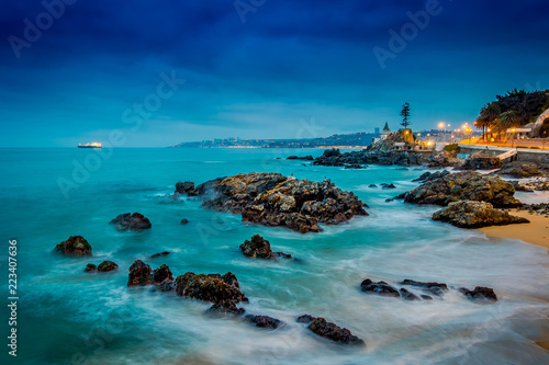 Beautiful view of Pacific rocky coast in Vina del Mar of waves hitting the rocks in Chile