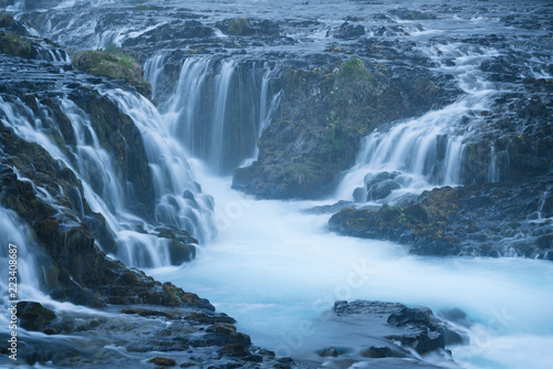 Turquoise cascades of the Bruarfoss waterfall  Iceland