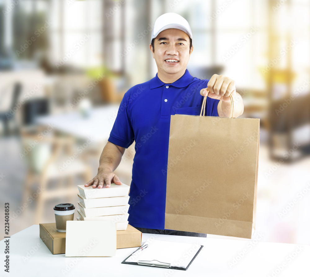 Food delivery service or order food online. Man holding paper bag and