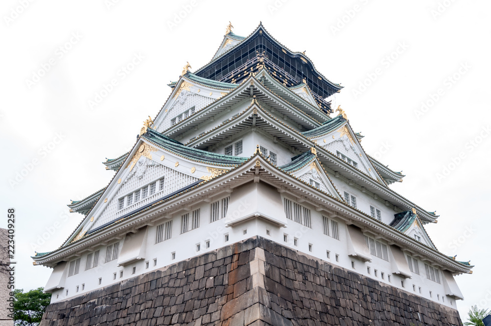 Osaka Castle with dramatic cloudy skies in Osaka, Japan. Osaka Castle with dramatic cloudy skies in Osaka, Japan.