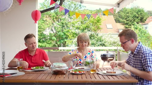 Wallpaper Mural Happy big family having fun and enjoy their talk with children during grilling at terrasse Torontodigital.ca