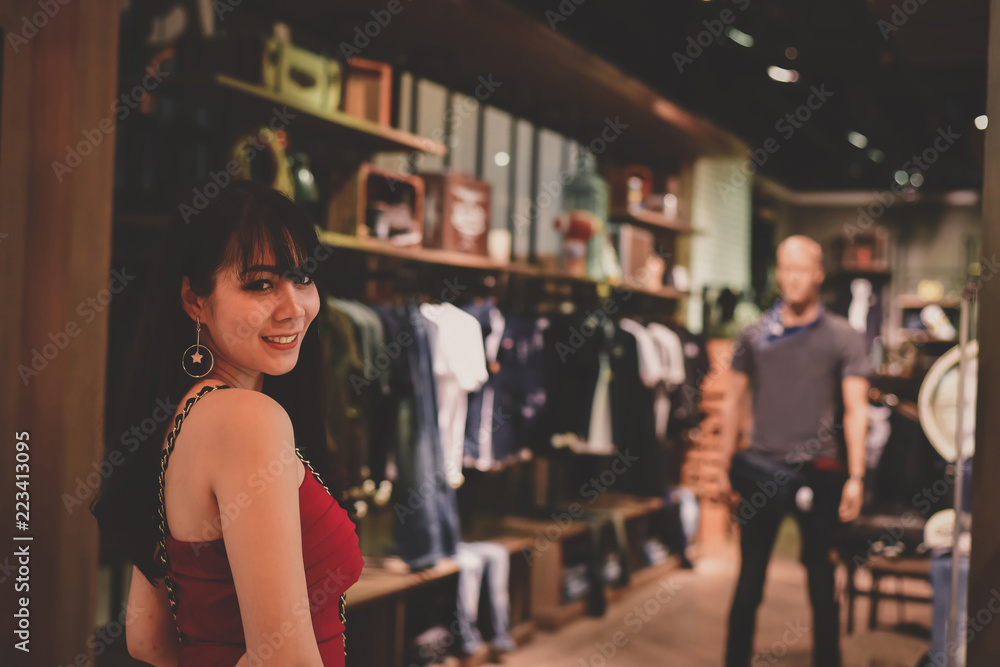Shopping Concept. Asian girls are shopping in the mall. Beautiful women are happy to shop in the mall. Beautiful girl walking in the mall. Shopping Concept. Asian girls are shopping in the mall. Beautiful women are happy to shop in the mall. Beautiful girl walking in the mall.