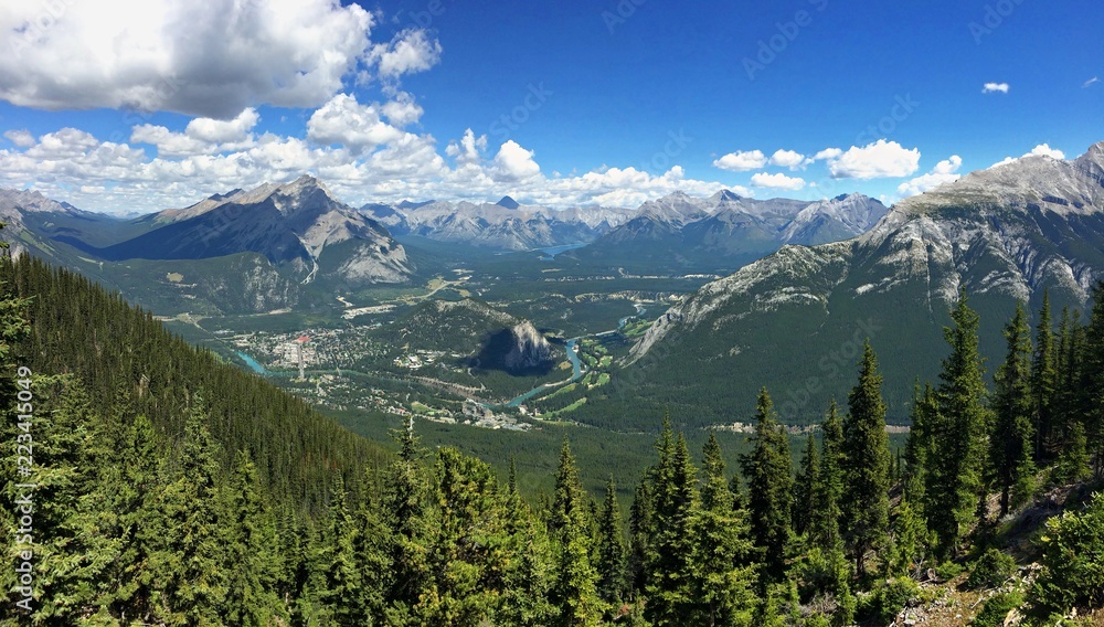 Sulphur Mountain in Banff National Park in the Canadian Rocky Mountains overlooking the town of Banff, river and famous hotel. The mountain with the hot springs on its lower slopes. Elevation 2451 m
