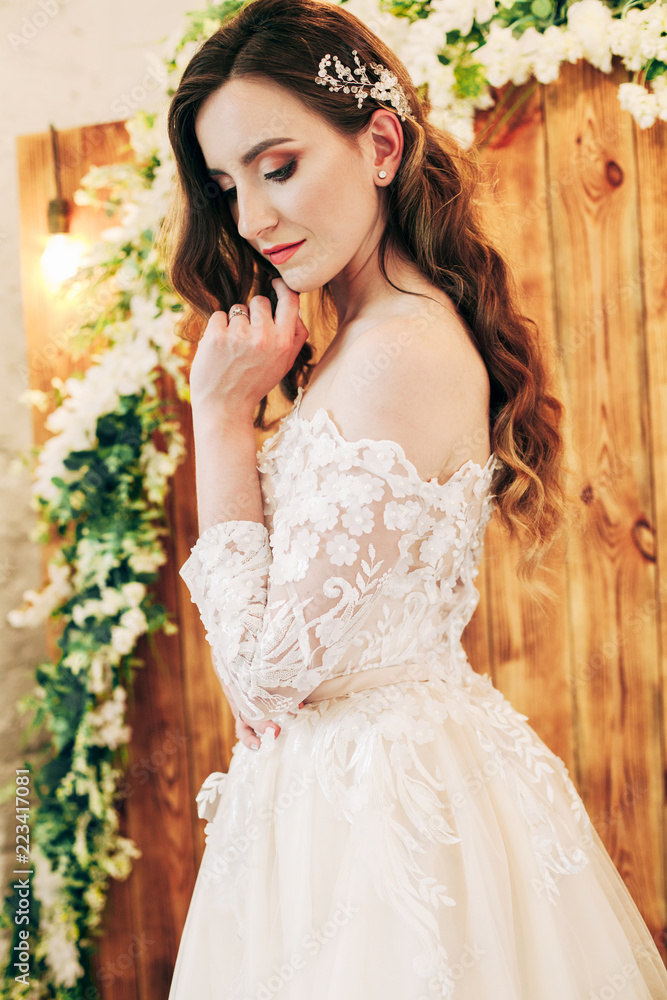 Fototapeta premium beautiful bride in a chic wedding dress