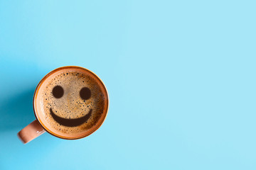 Cup of aromatic hot coffee on color background